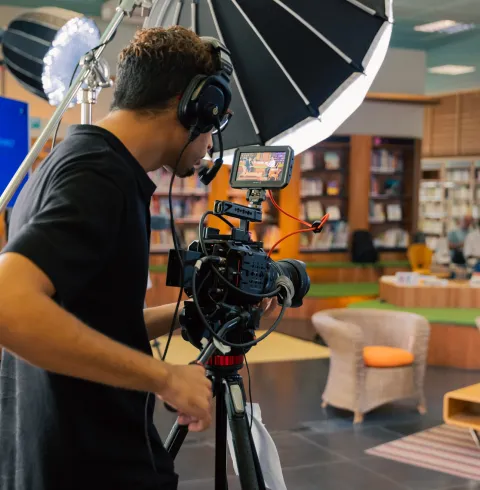 Cameraman filmant un Rendez-vous de l'Expertise